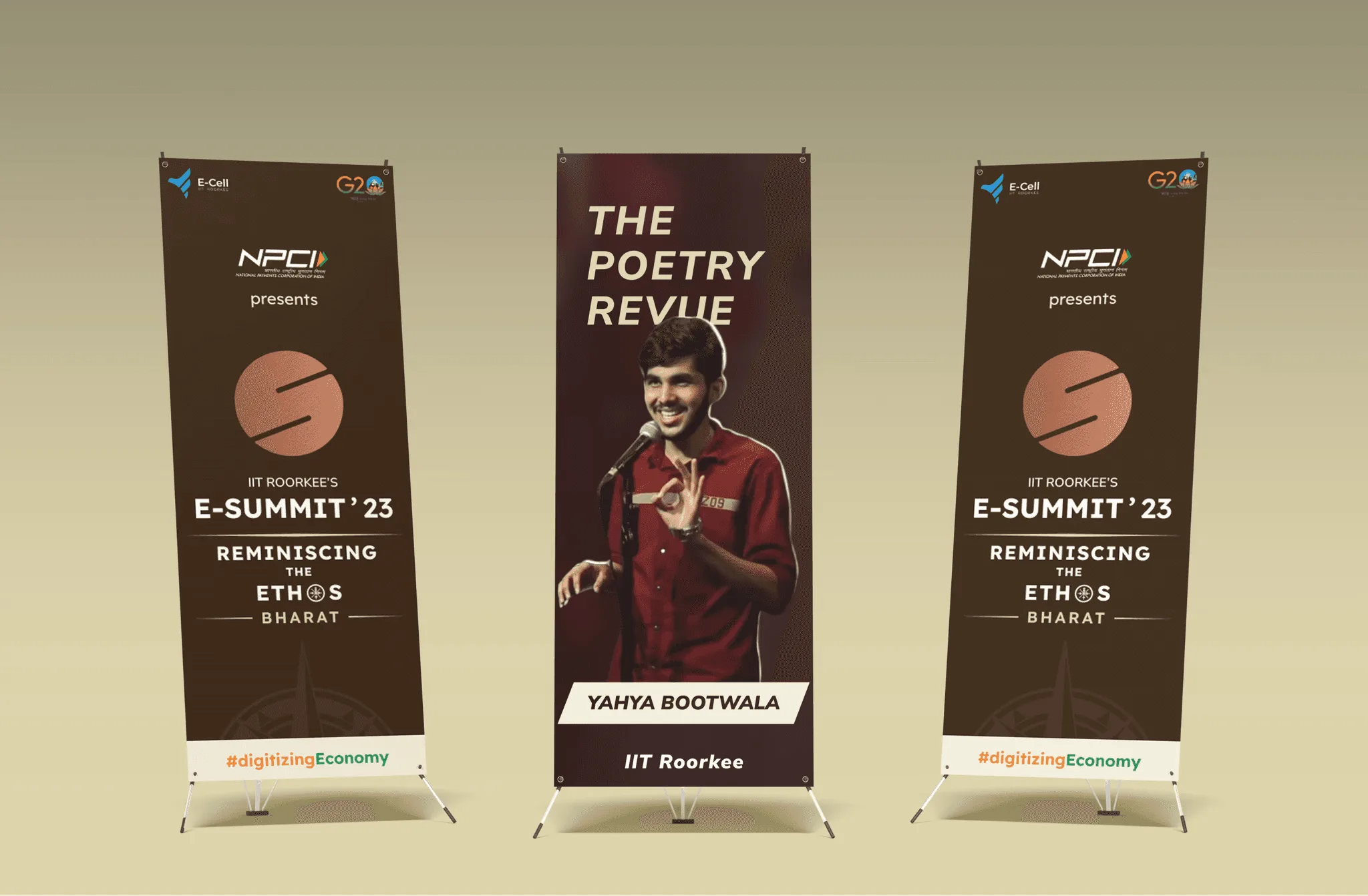 Three roll-up standees: two E-Summit '23 Reminiscing the Ethos standees presented by NPCI, flanking a Poetry Revue standee