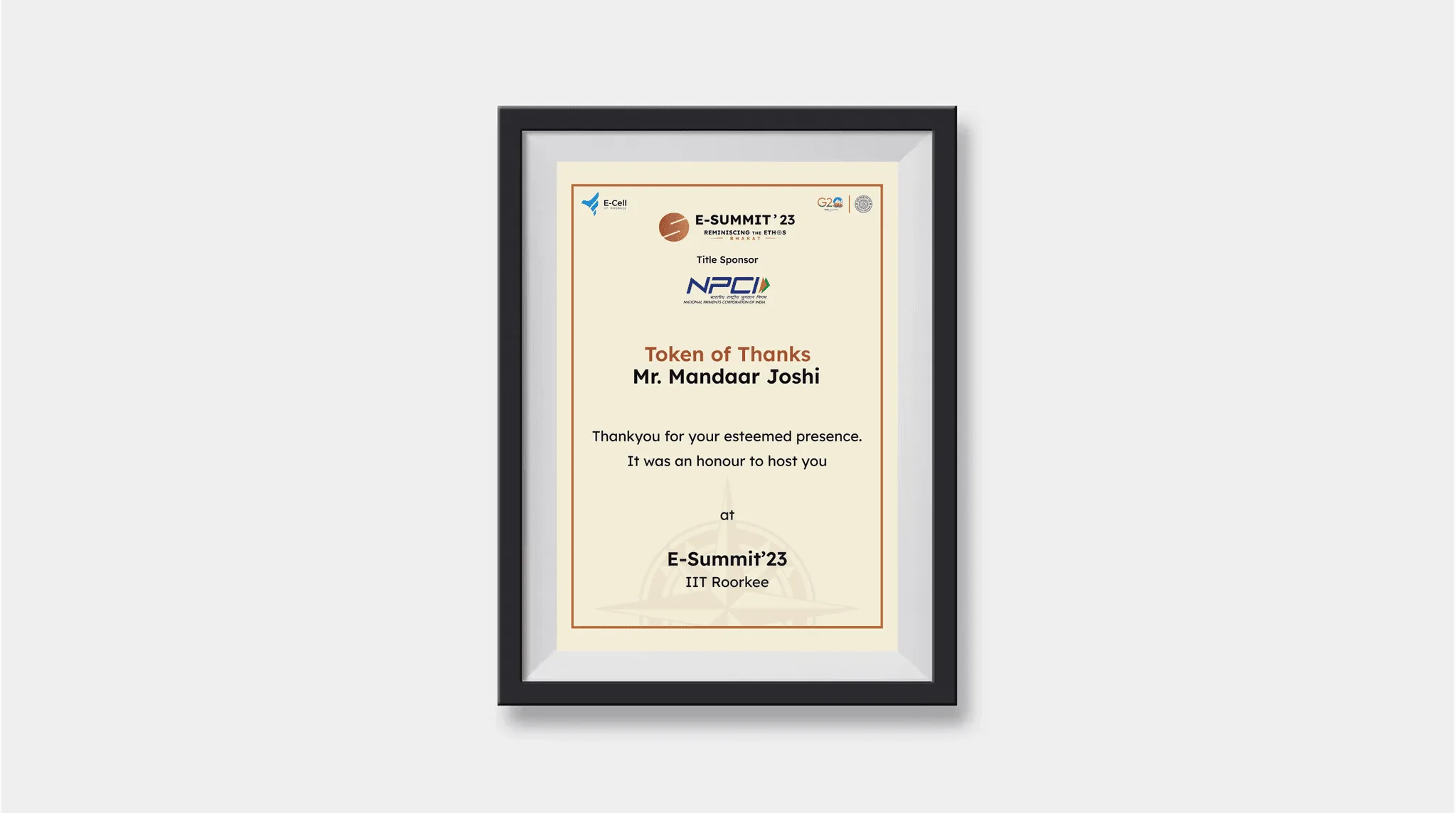 Framed Token of Thanks certificate with the NPCI title-sponsor logo and E-Summit '23 IIT Roorkee branding, on a light wall