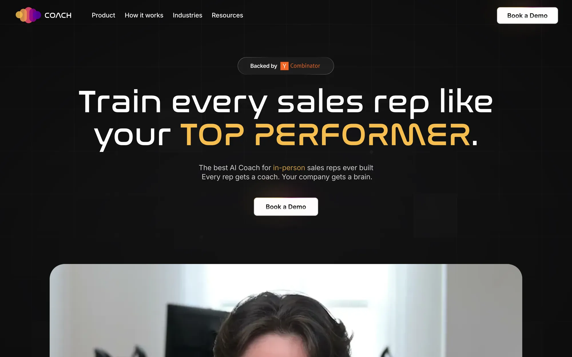 COACH homepage on black with the headline Train every sales rep like your top performer and a Book a Demo button in the header and under the headline